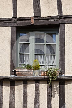 Half timbered house and windowbox, Dinan, France photo