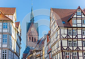 Half-timbered houses and church tower in Hannover