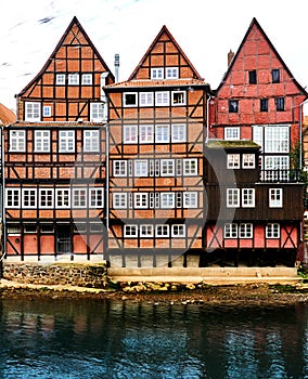 Half-timbered houses at the historic harbor of Lueneburg, Germany, on the bank of the river Ilmenau