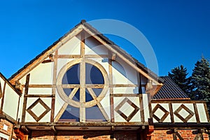 Half-timbered superstructure of a country house photo