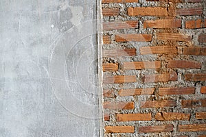 Half wall, half cement, half brick for background