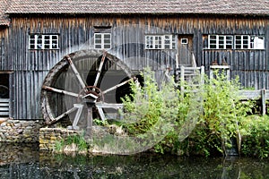 Half Water mill house in a village in Alsace