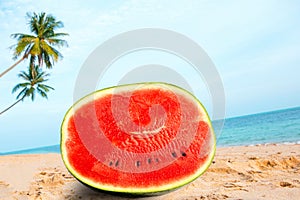 Half watermelon on the beach.