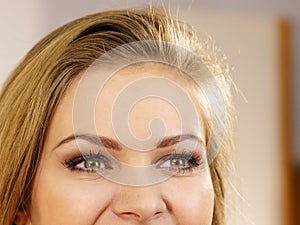 Half of woman face. Young female and her eyes