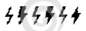 Halftone grunge lightning bolt collection. Dotted thunder bolt symbol set. Rough pixel flash thunderbolt element bundle