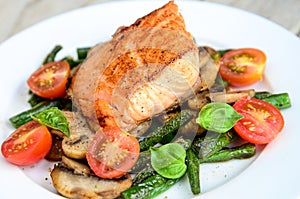 Halibut with asparagus and cherry tomatoes