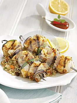 Halibut and vegetable brochettes, bed of quinoa
