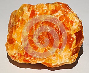 Halite crystal gem mineral stone orange yellow shiny brilliant photo