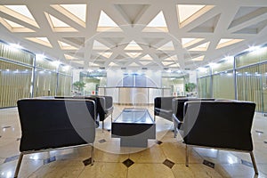 Hall with armchairs at business center