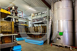 Hall with a automatization press for apples in factory, Asturian Sidreria photo