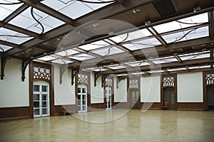 Hall with glass roof and laminate