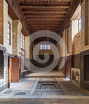 Hall at ottoman era historic house of Moustafa Gaafar Al Seleehdar, Cairo, Egypt with decorated ceiling and ornate marble floor photo