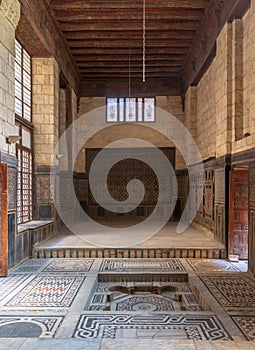 Hall at ottoman era historic house of Moustafa Gaafar Al Seleehdar, Cairo, Egypt with decorated ceiling and ornate marble floor photo