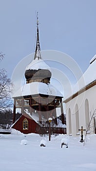 Hallans kyrka Belltower in winter in Jamtland in Sweden