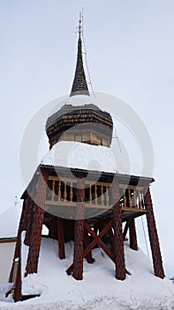 Hallans kyrka Belltower in winter in Jamtland in Sweden