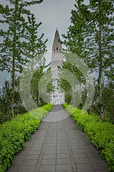 Hallgrimskirkja, a luteran church in the middle of Reykjavik, capital of Iceland, seen from back on a cloudy summer day