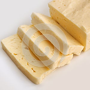 Halloumi Cheese over White photo
