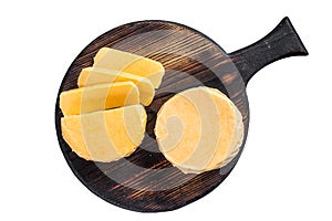 Halloumi sliced cheese on kitchen table. Isolated on white background.