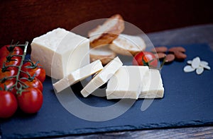 Halloumi squeaky cheese on a slate plate