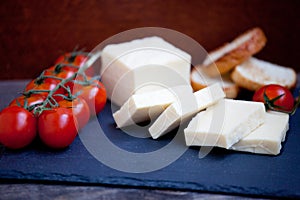 Halloumi squeaky cheese on a slate plate