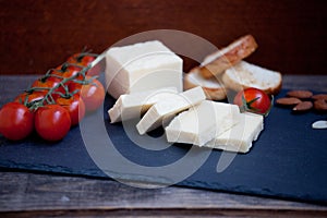 Halloumi squeaky cheese on a slate plate