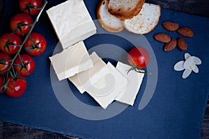 Halloumi squeaky cheese on a slate plate