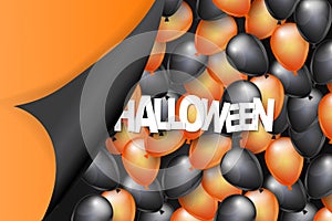 Halloween background design with black and orange balloons and pealing off curved egde wrapping paper.