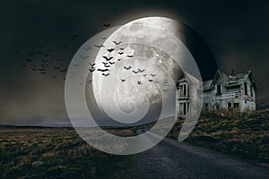 Halloween background with full moon and creepy house