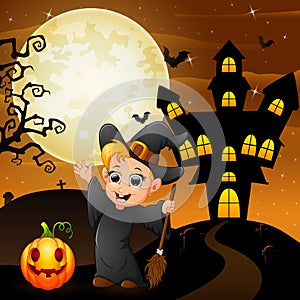 Halloween background with happy boy witch holding broomstick pumpkin