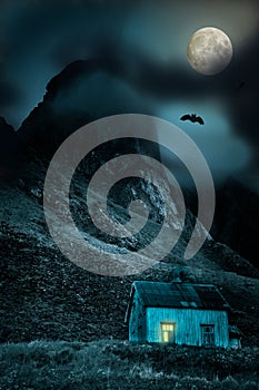 Halloween background with old wooden house