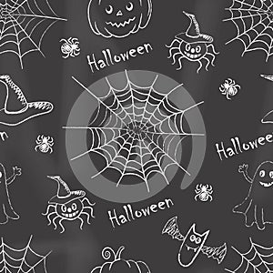 Halloween background. Seamless pattern with chalk drawings on the blackboard