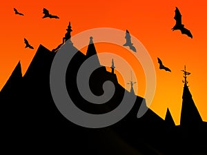 Silhouettes of castle roofs with  weathervanes and flying bats on red background