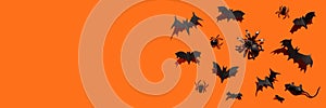 Halloween banner black bats orange copy space