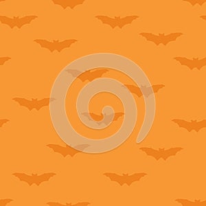 Halloween seamless pattern. Holiday background with flying bat photo