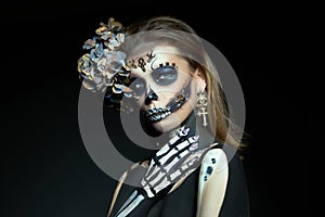 Halloween beauty skeleton woman makeup face. Girl death Halloween costume. Day of The Dead. Charming and dangerous Calavera