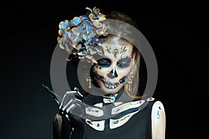 Halloween beauty skeleton woman makeup face. Girl death Halloween costume. Day of The Dead. Charming and dangerous Calavera