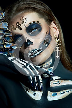 Halloween beauty skeleton woman makeup face. Girl death Halloween costume. Day of The Dead. Charming and dangerous Calavera