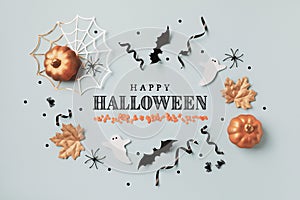 Halloween blue background with party decorations from pumpkins, bats, spider web and ghosts. Holiday card for Happy halloween