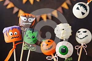 Halloween cake pops and marshmallow with funny monster faces