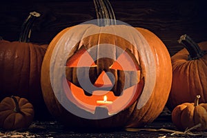 Halloween Carved Pumpkin. Jack O Lantern with burning candle inside.