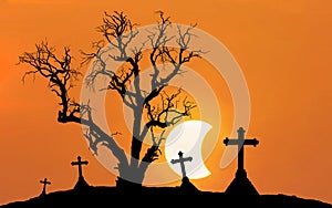 Halloween concept background with scary silhouette dead tree and spooky silhouette crosses with half moon