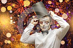 Halloween concept. Halloween party background. Man with costumes and makeup on a celebration of Halloween.