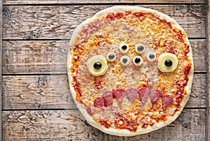 Halloween creative scary food monster zombie face with eyes pizza snack