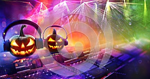 Halloween Disco Music - Pumpkins With Headphones In Nightclub With Confetti