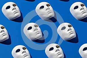 Halloween face mask pattern on blue background. Minimal holiday season concept. Flat lay