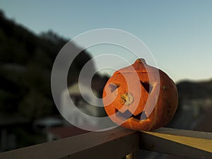 Halloween face pumpkin at sunset