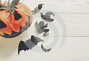 Halloween flat lay. jack lantern pumpkin with witch ghost bats a