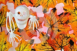 Halloween Ghost-autumn maple leaf background. Halloween, the main celebration of the supernatural, the custom to frighten and
