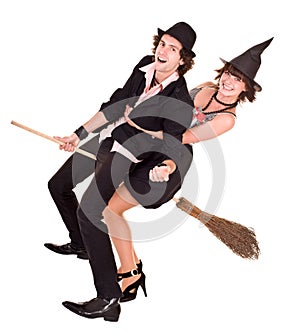 Halloween girl witch on broom bear man.