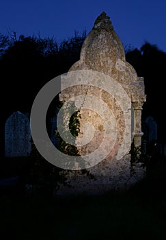 Halloween gravestone and ghost
